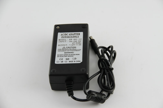 ব্ল্যাক 60W 60Hz এসি 12 ভোল্ট পাওয়ার অ্যাডাপ্টার 12 ভোল্ট স্থিতিশীল পালটানোর সঙ্গে IP54 করতে